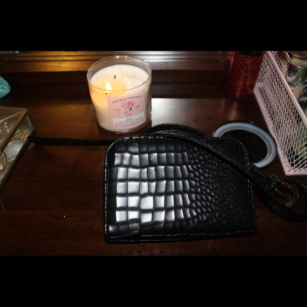 black snakeskin clutch fanny pack